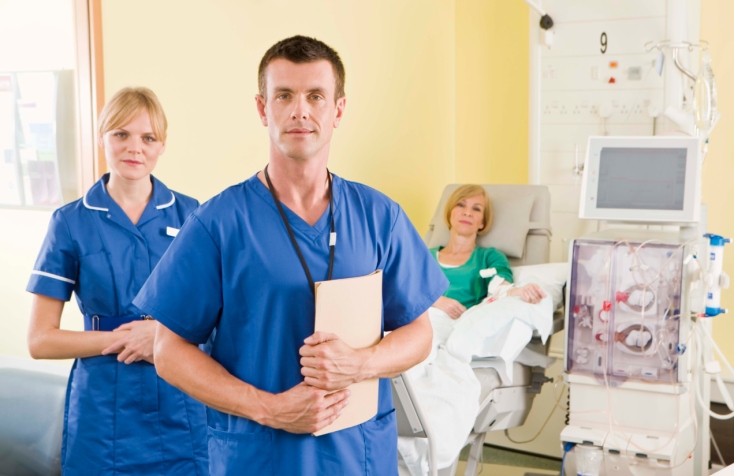 Nurses with patient in hospital